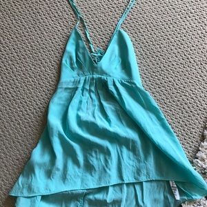 Aritzia turquoise blouse.